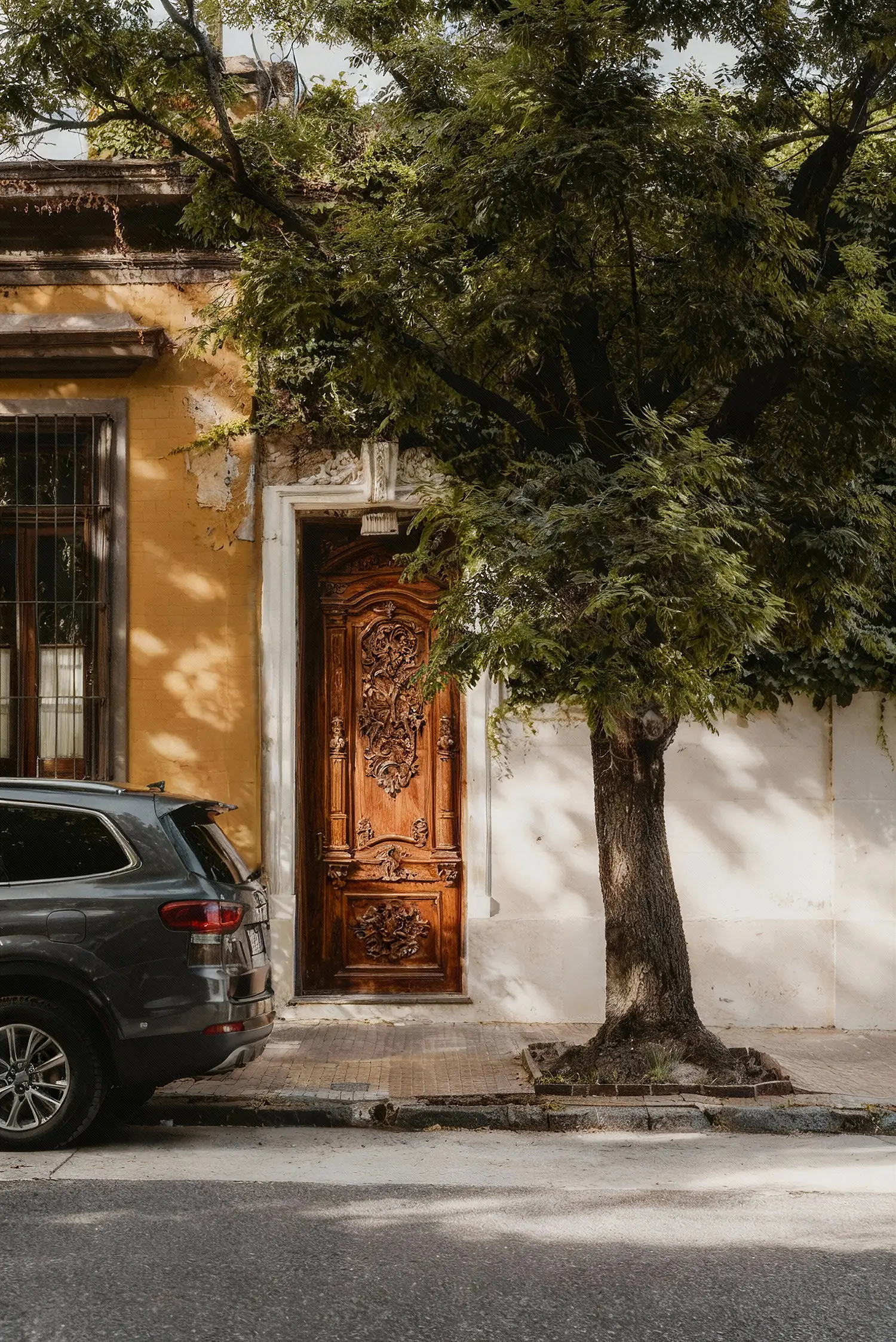A car parked in front of a house